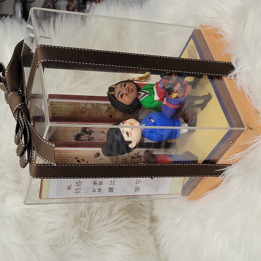 Talk Talk Studio encased BLK and white engagement figurines from Korea.